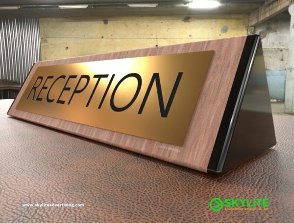 Engraved Brass Reception Sign on Wood